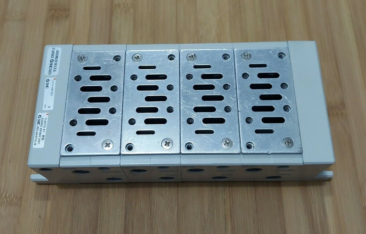 SMC VV714-02R-03D 4 Valve Head Manifold Brand NEW (RE209)