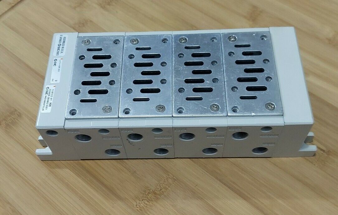 SMC VV714-02R-03D 4 Valve Head Manifold Brand NEW (RE209)